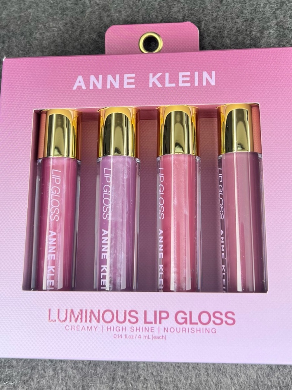 Anne Klein  Luminous Lip Gloss . Creamy/ High Shine/ Nourishing.